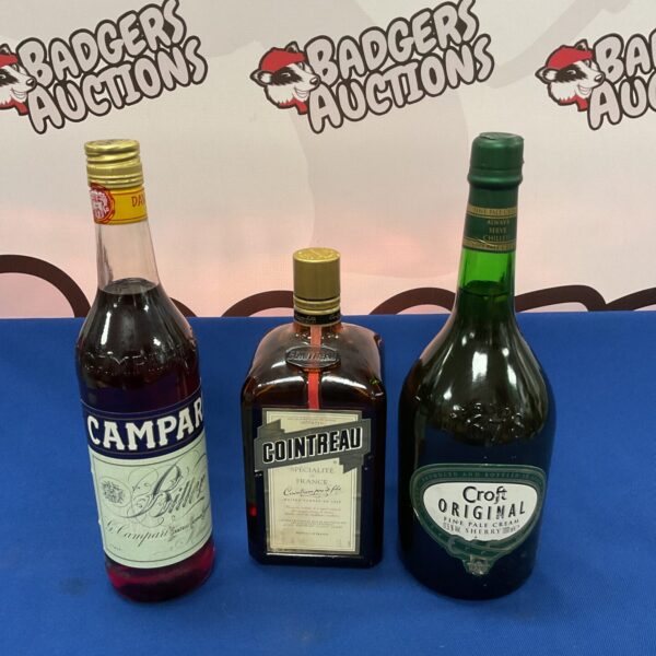 Red Campari bottle, vintage alcohol collectible.