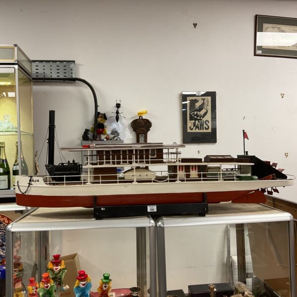 Detailed view of the large Raja remote control model boat.