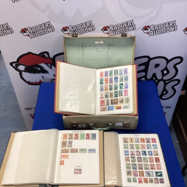 Vintage stamp albums in a carrying case, a collectible philately set.