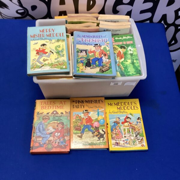 A collection of vintage Enid Blyton books, showcasing classic children's literature.