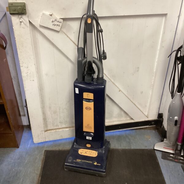 Sebo Automatic X4 upright vacuum cleaner in a home setting.