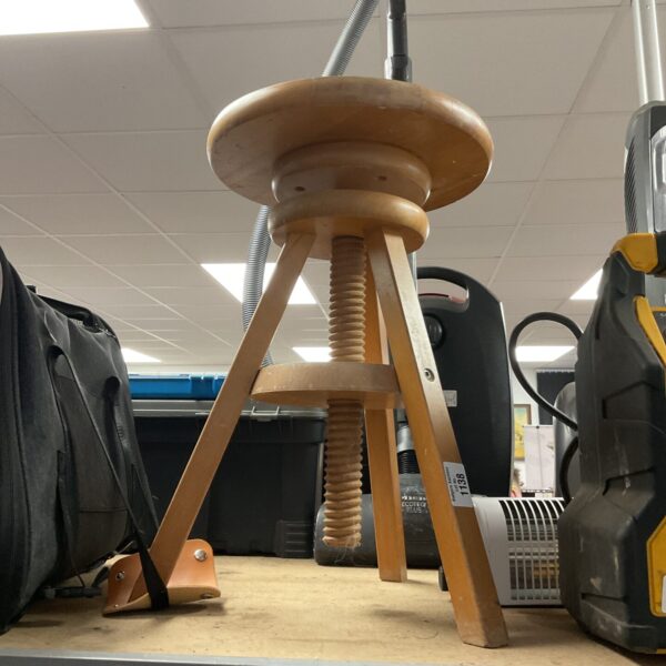 Vintage wooden potters stool with adjustable height.