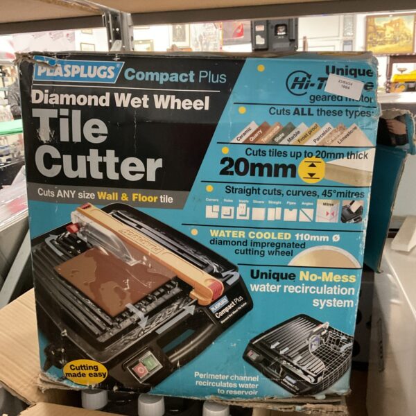 Plasplugs tile cutter with diamond blade for precise tile cutting.