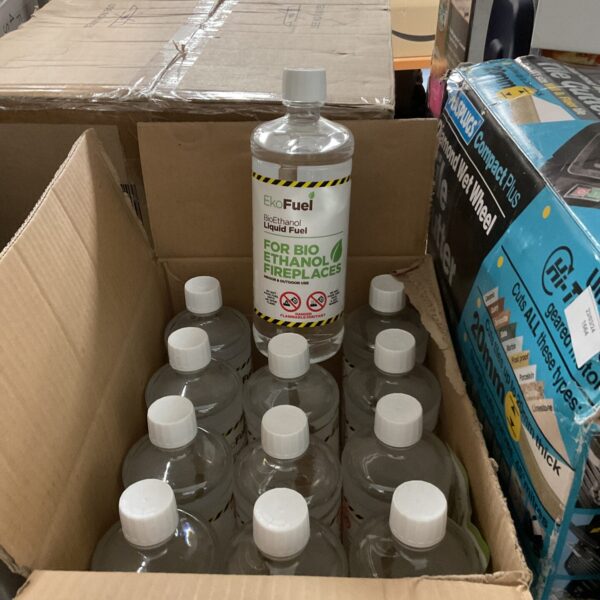 Twelve bottles of clear bio ethanol fuel for fireplaces.