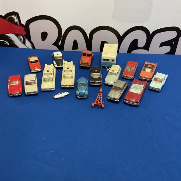 Vintage Dinky diecast model collection featuring various toy cars and vehicles.