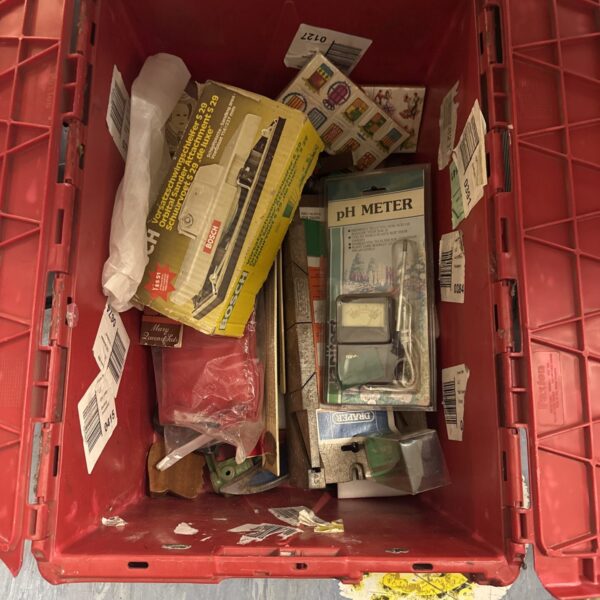 Shed clearance lot with vintage tools and garden items.