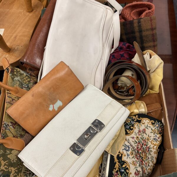 Mixed lot of handbags, scarves, and purses including a Radley bag.