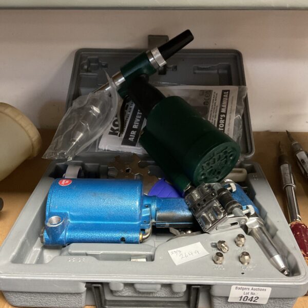 Kobe professional air riveter in its original carrying case.