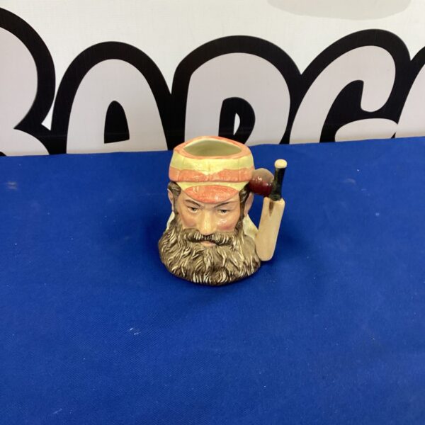 Vintage Royal Doulton WG Grace Toby Jug, detailed stoneware figurine.