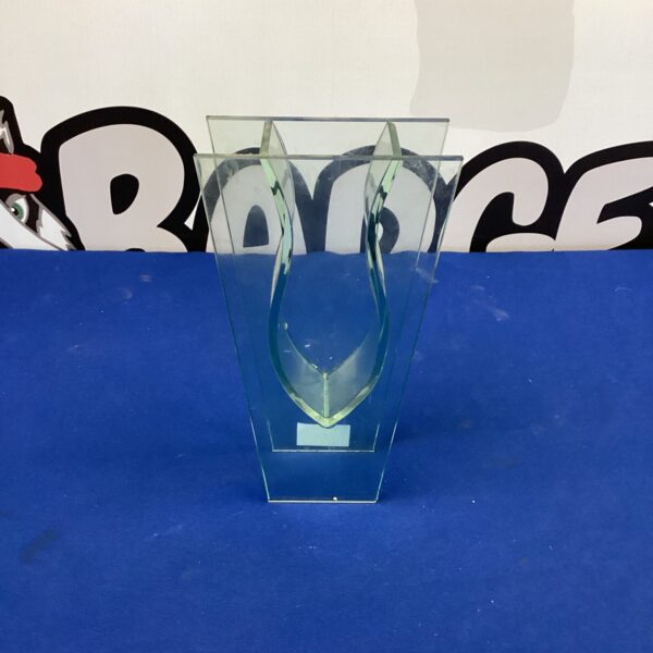 Clear vintage V glass vase with angular design.