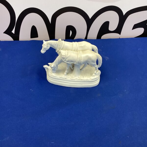 Detailed Victorian Parian porcelain horse figurine on a floral base.