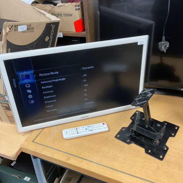 White Samsung 27 inch HD television with wall mount.