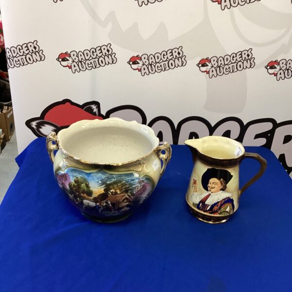 Vintage Staffordshire pottery jug with floral design.