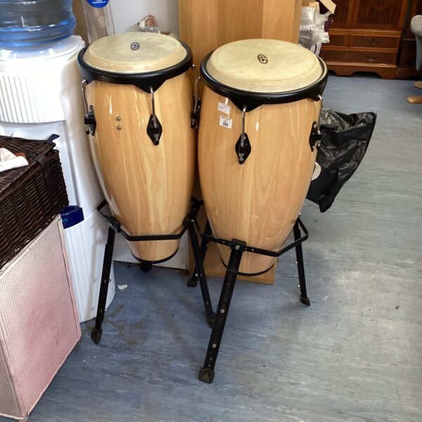 Pair of CP cosmic percussion conga drums on stands.