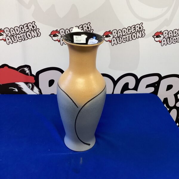 Vintage West German pottery vase with hand-painted design.
