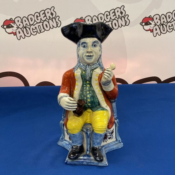 Antique Ralph Wood toby jug, colourful delph pottery figure.