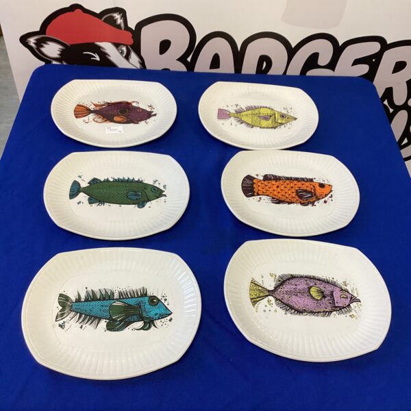 Vintage Washington Pottery Aquarius plate with zodiac design.