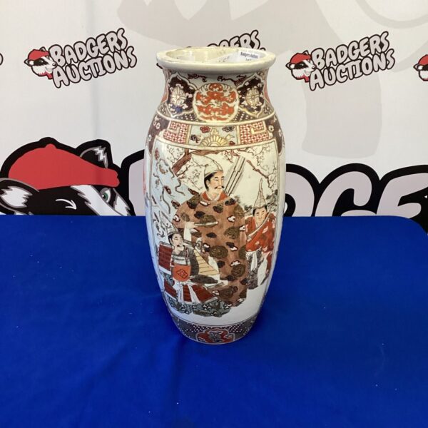 Intricate vintage Japanese Satsuma porcelain vase with floral designs.