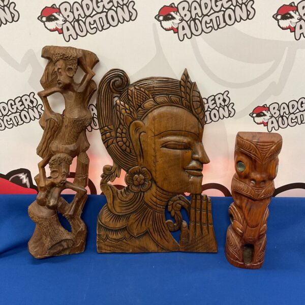 Detailed African carved hardwood figure with Indonesian influences.