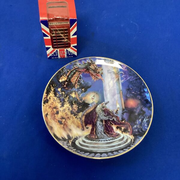 Royal Doulton Dragon Master collectors plate, detailed porcelain artwork.