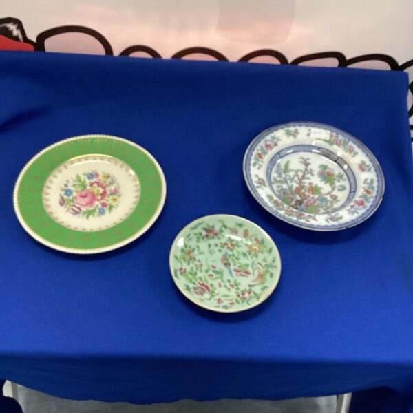 Antique Japanese hand-painted porcelain plate with floral design.