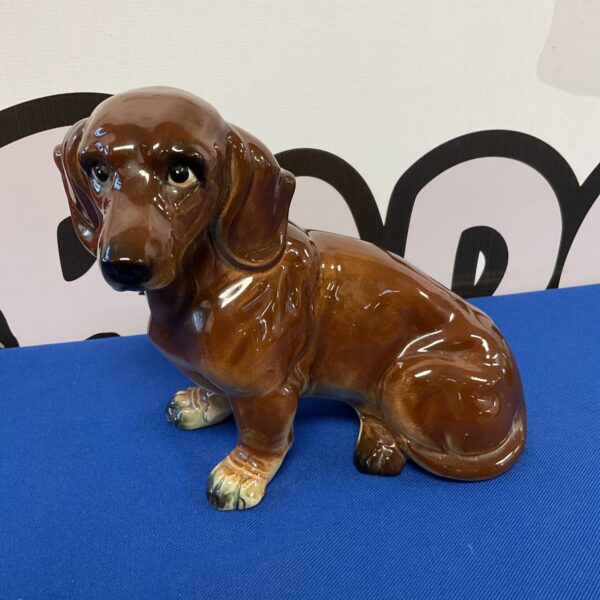 Vintage mid-century porcelain dachshund dog ornament.