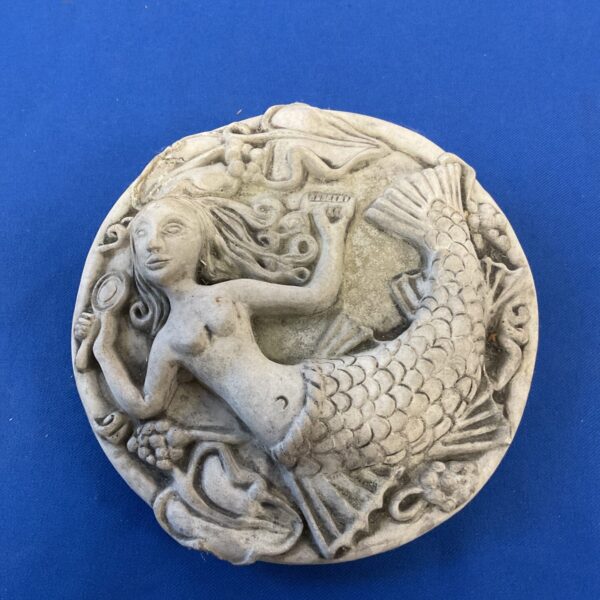 Vintage cast stone mermaid wall plaque for garden or home decor.