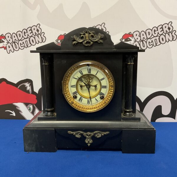 Antique Ansonia slate mantle clock with pendulum, vintage timepiece.