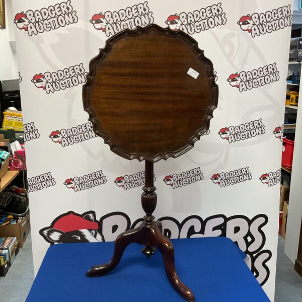 Antique Georgian mahogany pie crust tilt top table with tripod legs.