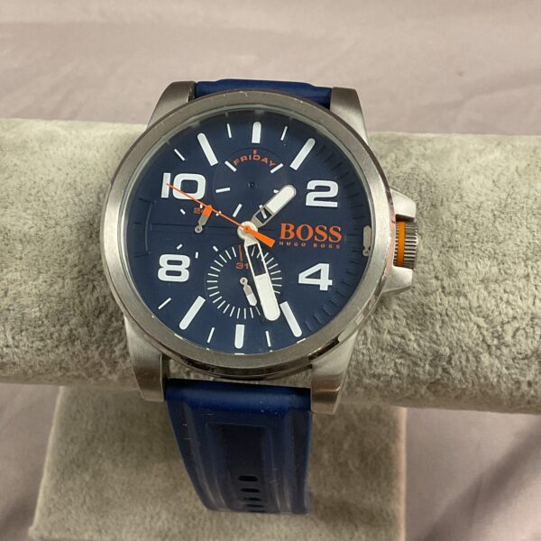 Stylish Hugo Boss wristwatch with blue dial and rubber strap.