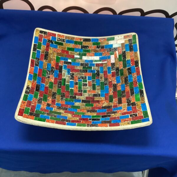 Vibrant colourful mosaic bowl with intricate glass design.