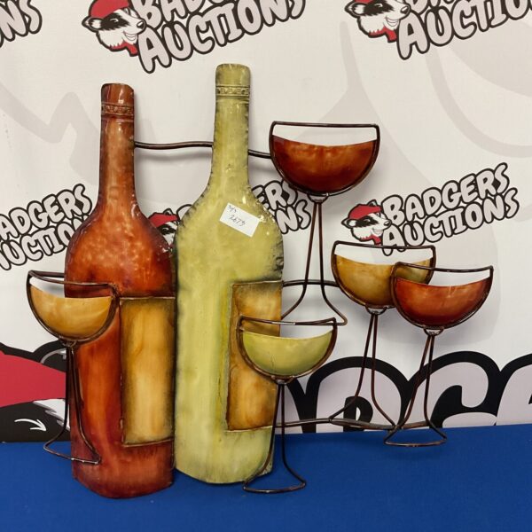 Vintage metal wine bottle wall art for kitchen decor.
