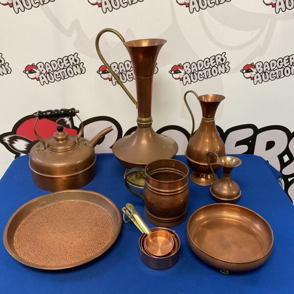 Antique copper pitchers, tankard and claw foot bowl collection.