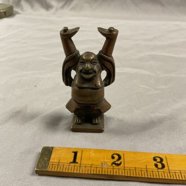 Detailed bronze oriental figure, a vintage collectible statue.