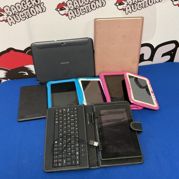 Mixed lot of tablet computers including Amazon Fire and Samsung devices.