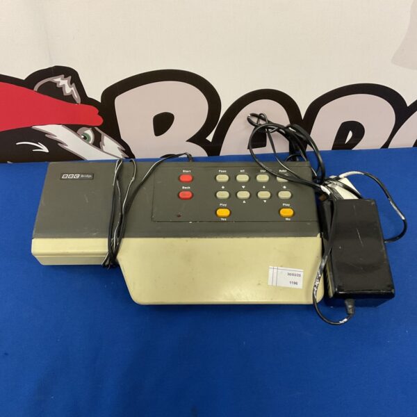 Vintage BBC bridge machine for card game bidding and scoring.