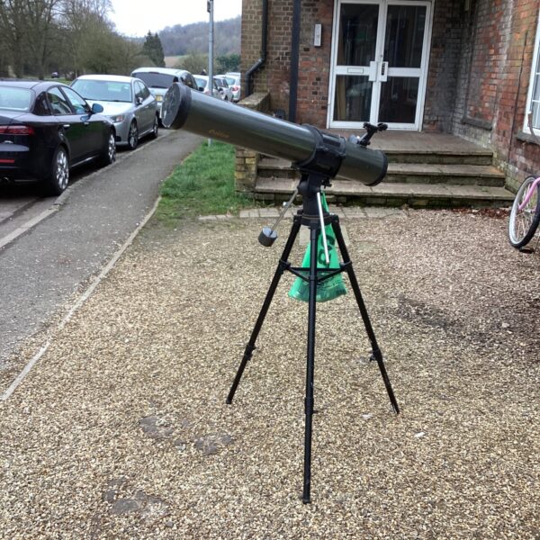Vintage Galileo telescope on tripod, ideal for astronomical observation.