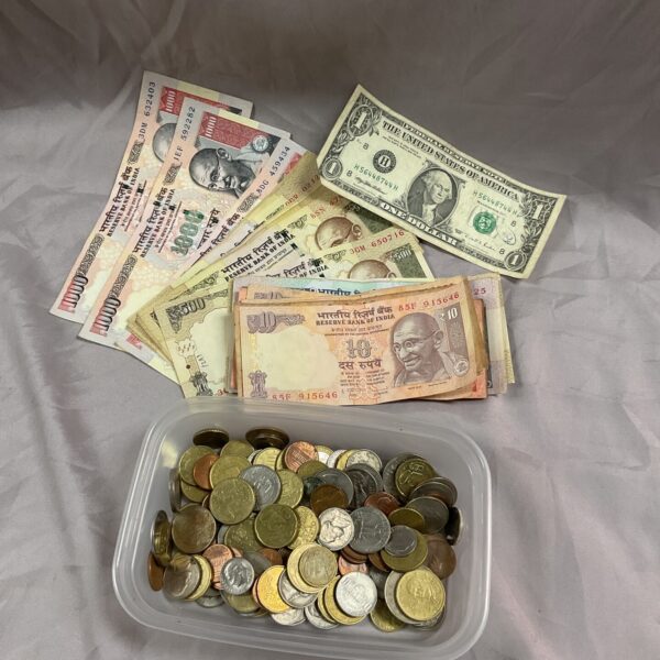 Mixed currency lot featuring euro coins and Indian rupee banknotes.