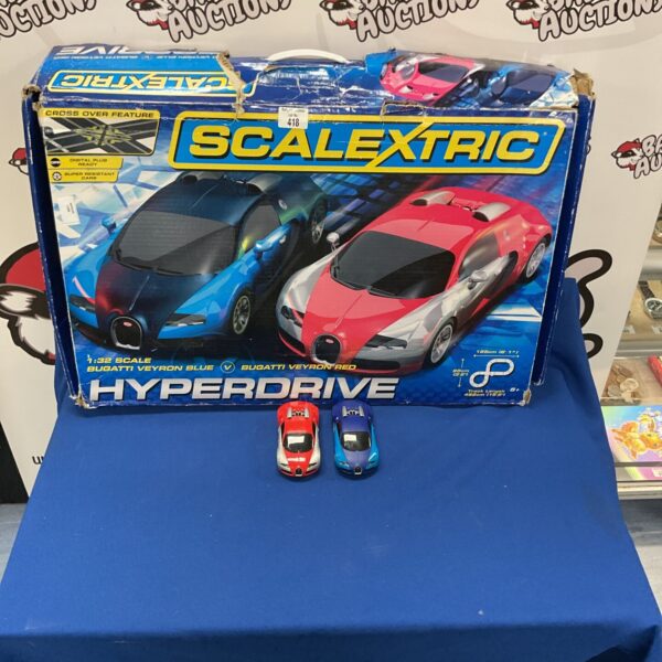 Vintage Scalextric Hyperdrive race track set with cars.