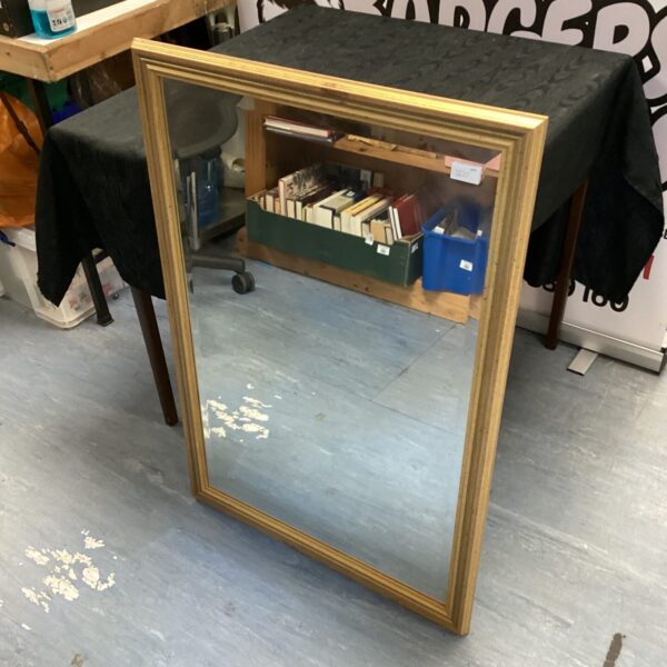 Ornate gilt framed mirror for wall mounting, vintage style.