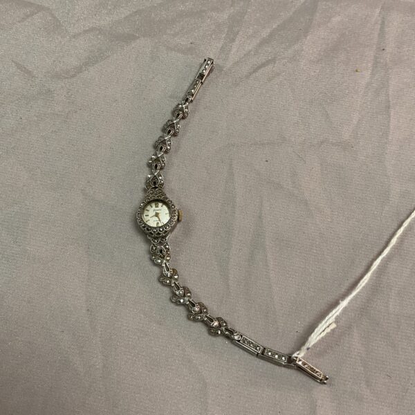 Vintage silver marcassite Accurist watch with intricate detailing.