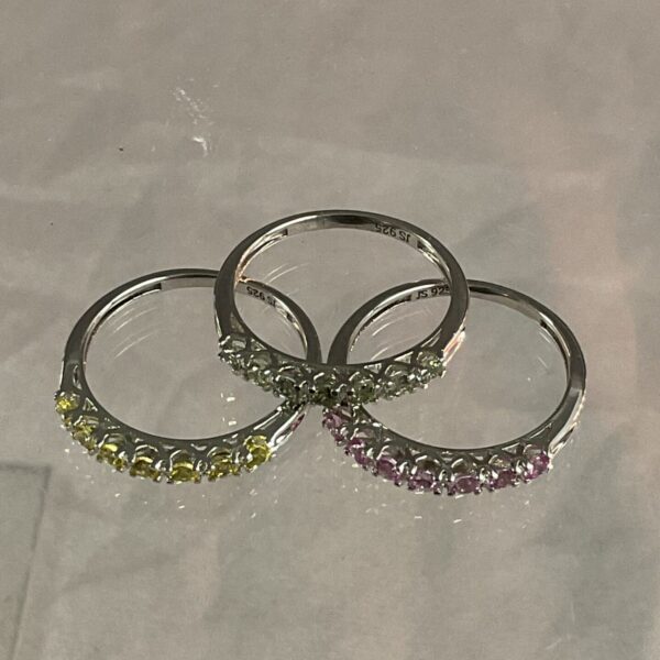 Lot of three silver coloured stone rings.