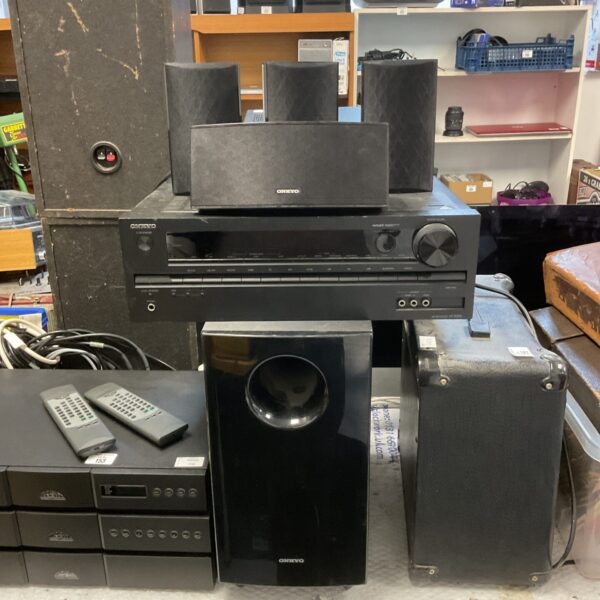 Onkyo HT-R393 home cinema system with subwoofer and speakers.