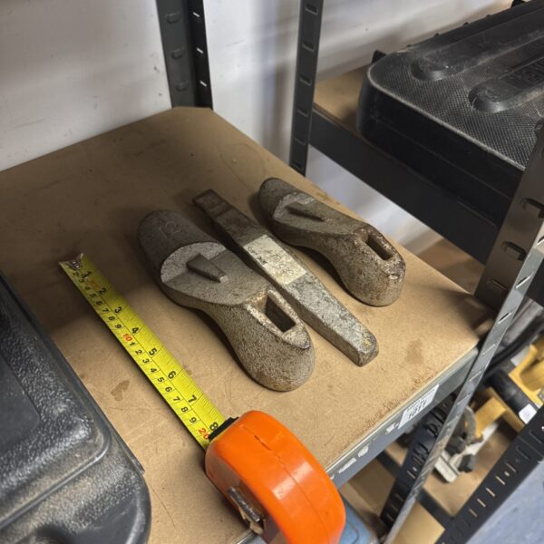 Vintage set of children’s shoe lasts for leatherworking and repair.
