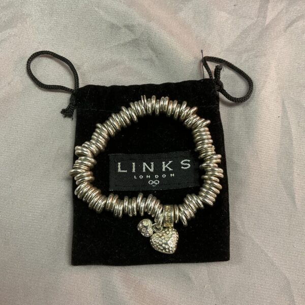 Vintage silver Links London charm bracelet with heart pendant.