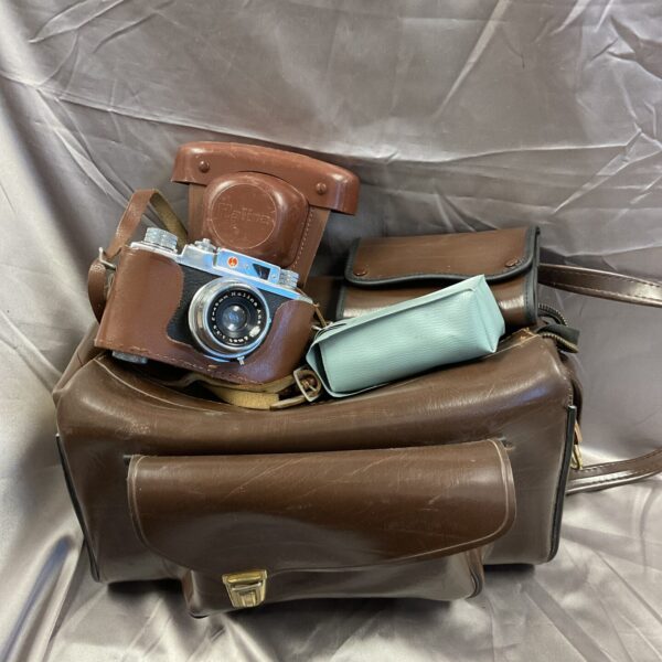 Vintage Halina Anastigmat camera with leather carrying bag.