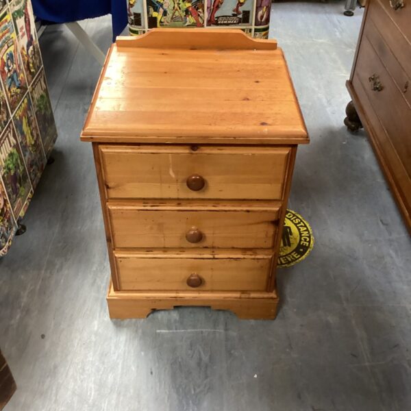 Vintage pine bedside cabinet with single drawer and shelf.