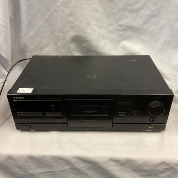 Black Teac V-615 cassette deck, vintage audio equipment.