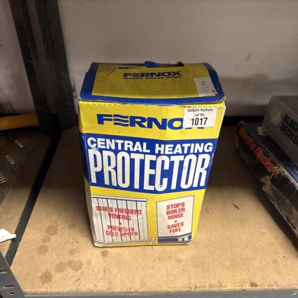 Sealed bottle of Fernox central heating protector for efficient heating.