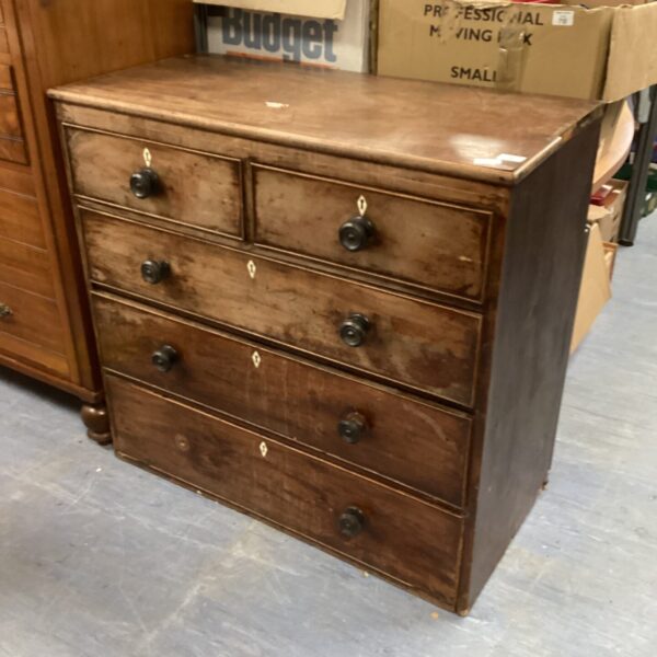 Vintage oak chest of drawers with two over three drawers.